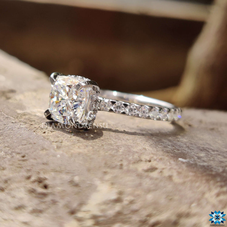 Handmade cushion moissanite ring in pave setting.
