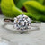 Round Solitaire Engagement Ring with a classic touch.