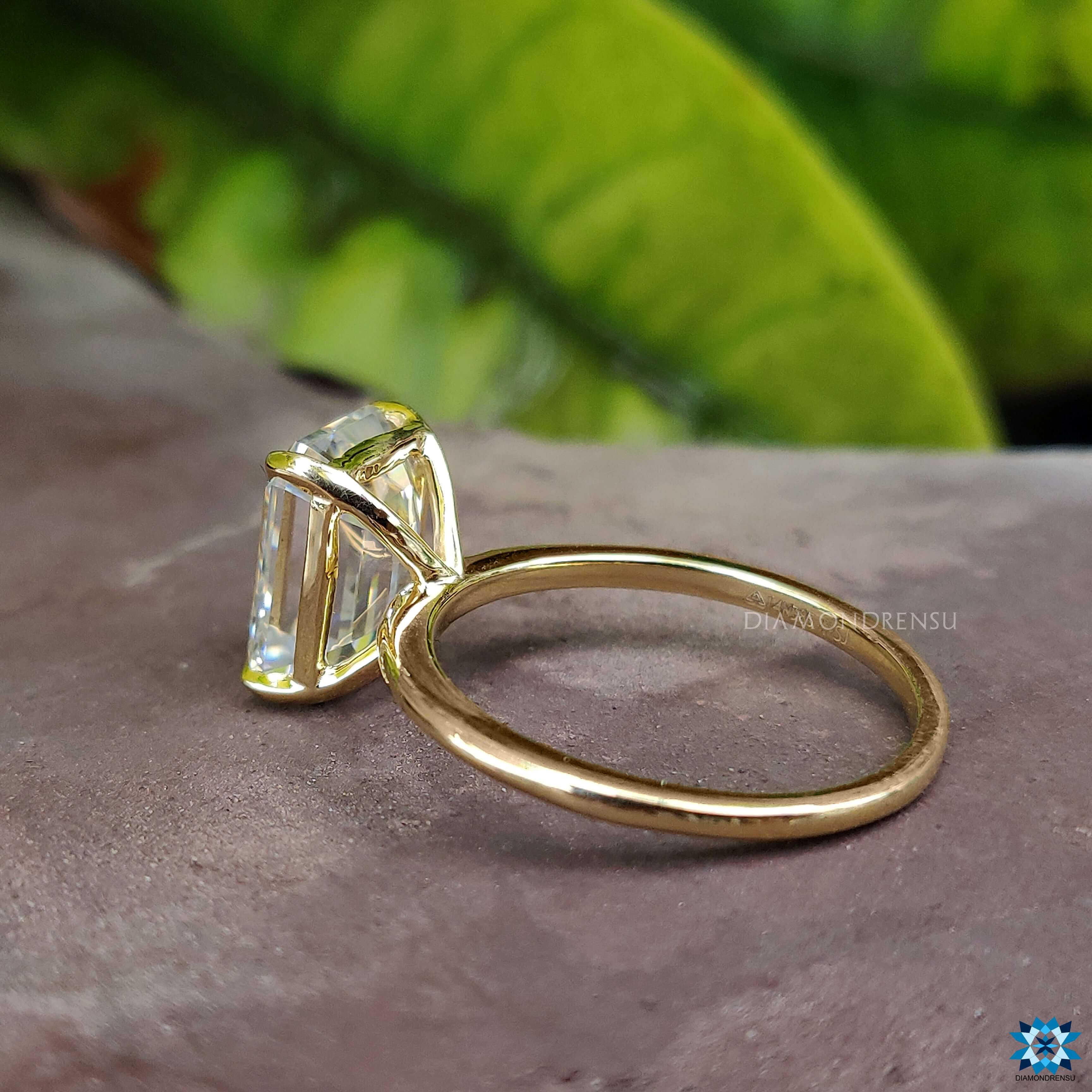 Unique emerald cut moissanite ring​ perfect for those who appreciate handmade jewelry.
