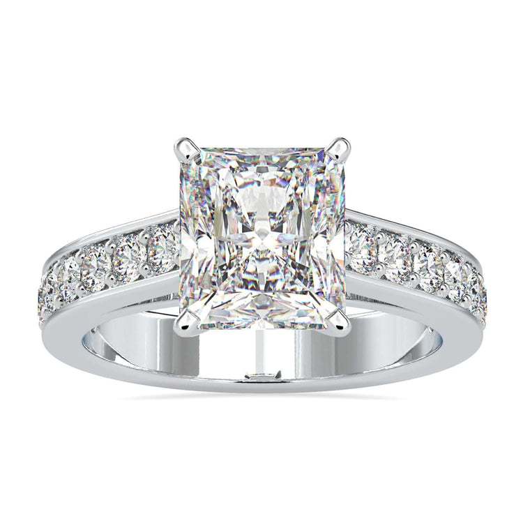 Radiant cut diamond ring with handmade white gold band.
