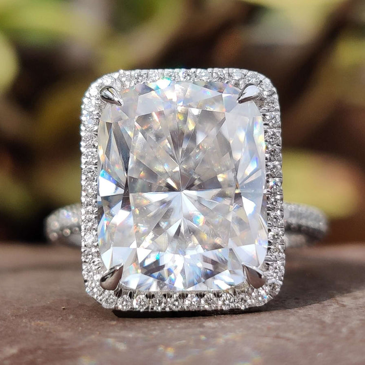 Cushion cut moissanite ring with hybrid design.
