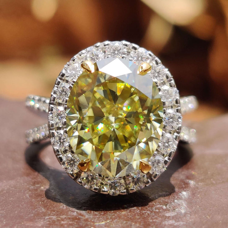 Double hidden halo engagement ring with oval cut stone.
