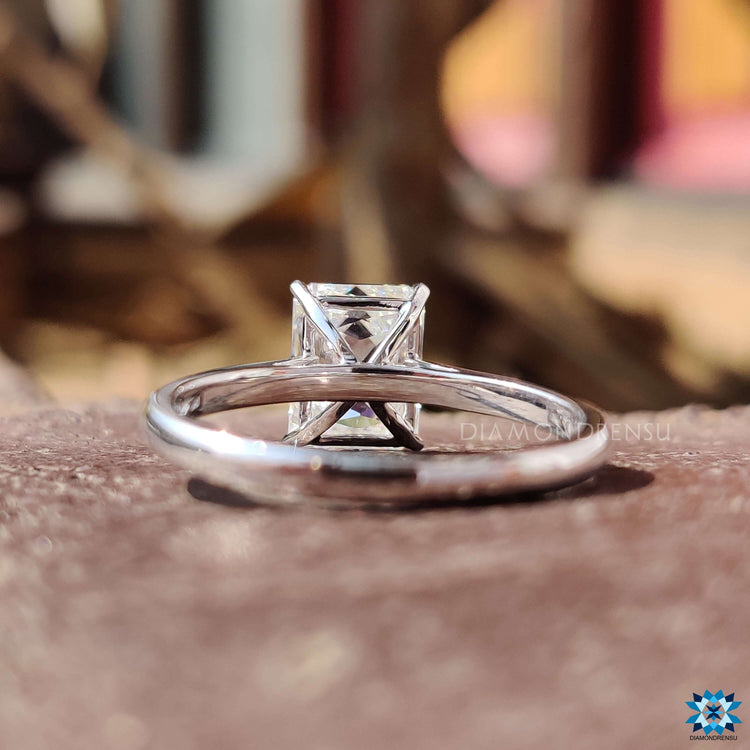 Handmade moissanite ring featuring criss cut center stone.
