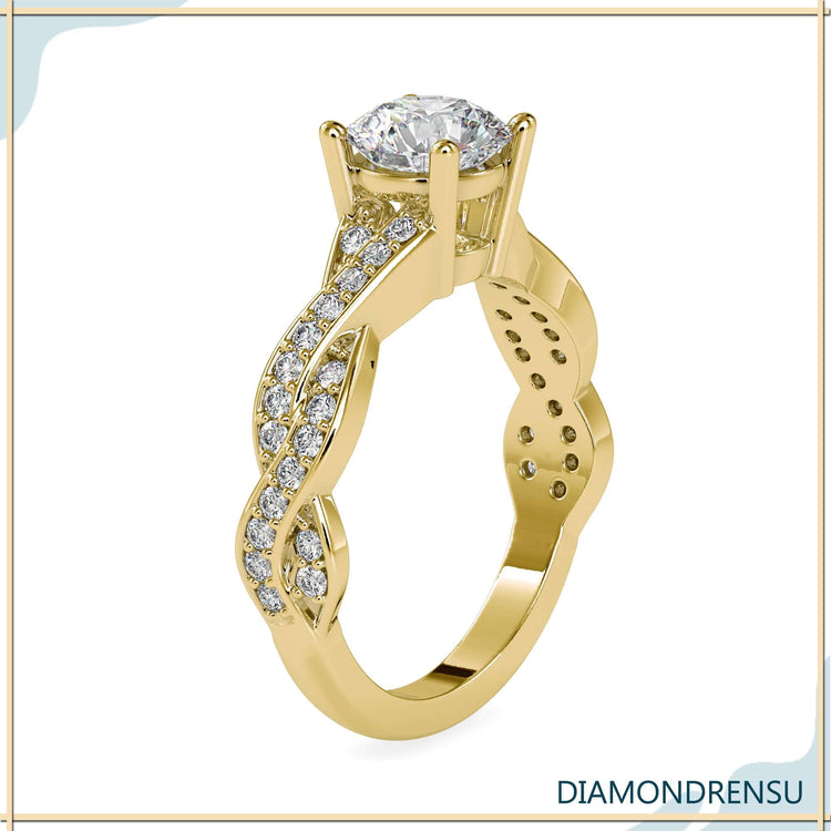 Rose gold ring with round cut diamond and twisted pave band.
