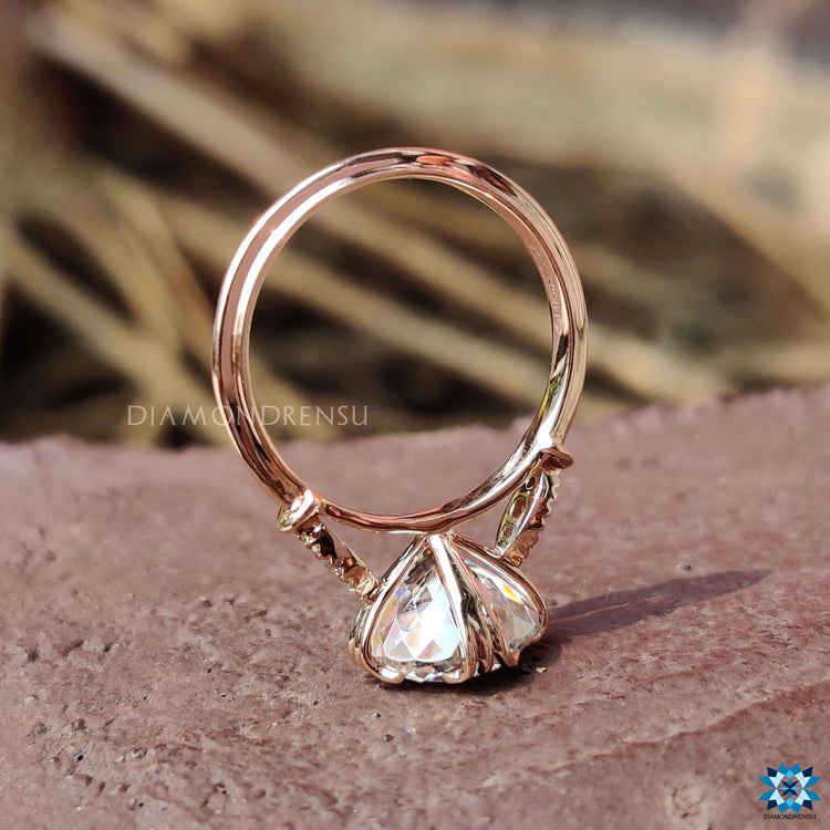 Vintage inspired engagement ring with moissanite.
