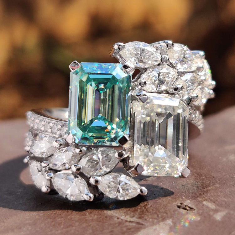 Emerald cut moissanite engagement ring in white gold.
