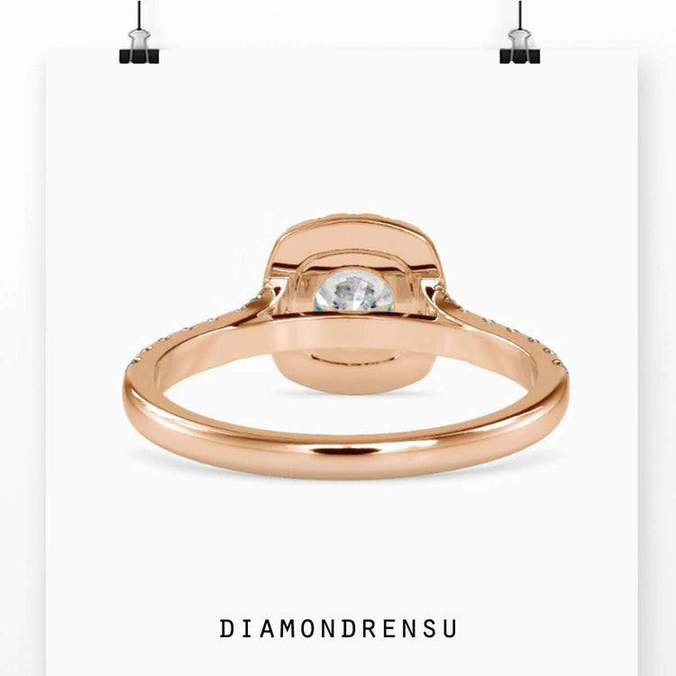 Yellow gold engagement ring with round pave diamonds.

