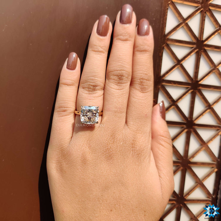 Handmade engagement ring with cushion Rensu cut moissanite.
