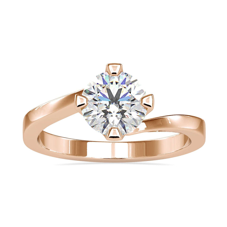 Round diamond engagement ring with minimal design in white gold
