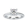 Round solitaire engagement ring with a stunning lab-grown diamond, featuring a knife edge band for a sleek design.
