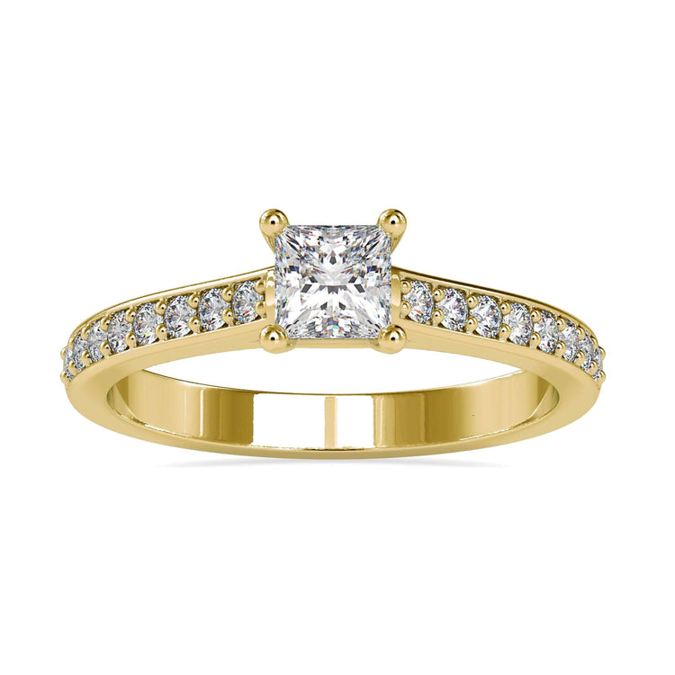 Custom engagement ring with four round prong setting.
