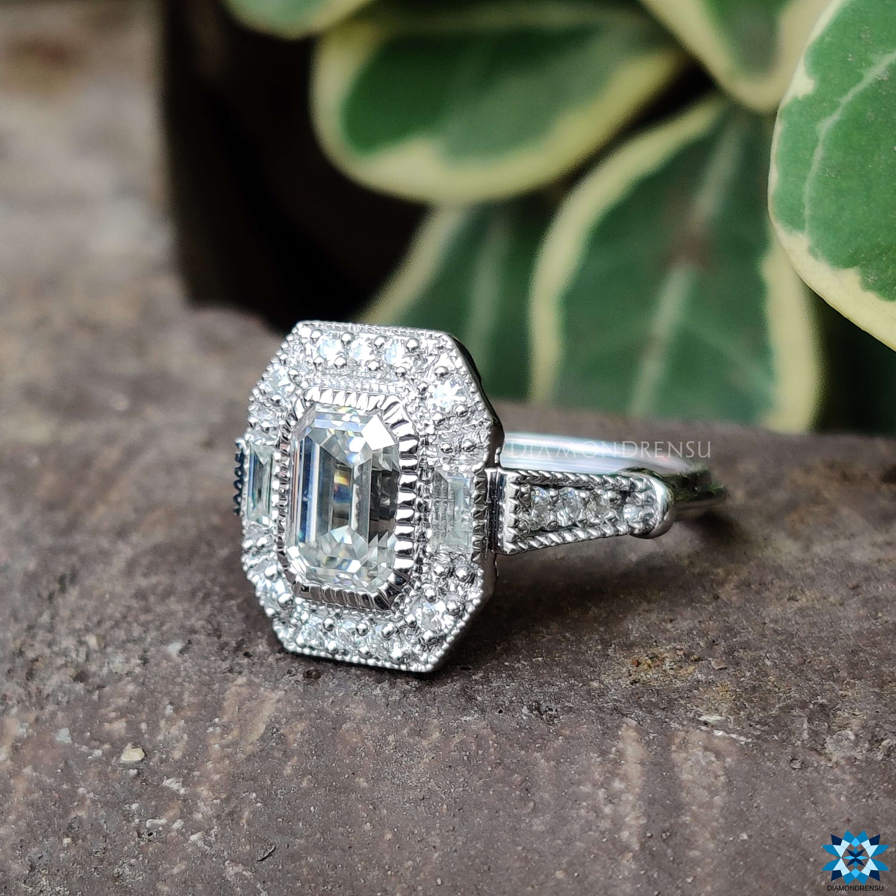 Milgrain ring with a gorgeous emerald cut ring centre stone.