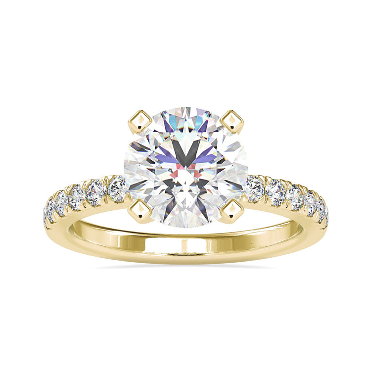 Round diamond ring with 4 prong setting in yellow gold.

