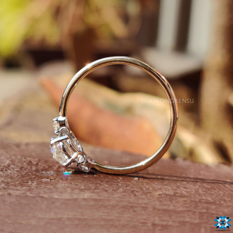 Vintage-inspired three stone ring with rose cut and European cuts.
