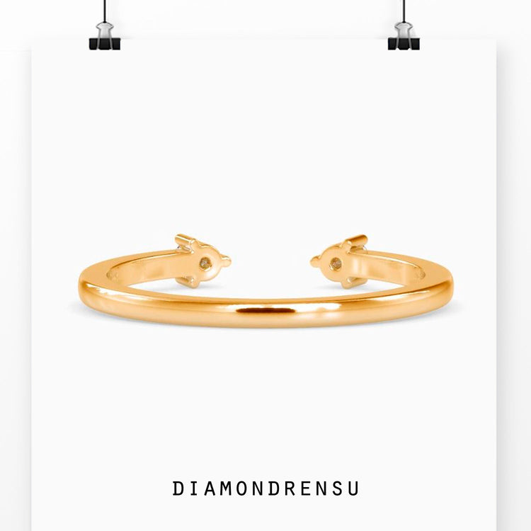 Custom handmade open gap wedding band in rose gold.
