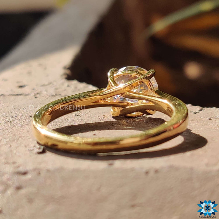 Solitaire moissanite ring in a four prong setting.
