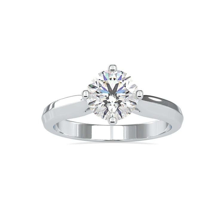 White gold engagement ring with compass prong and custom design.
