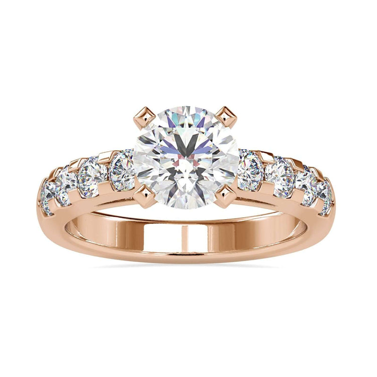 Diamond hidden halo engagement ring with round cut centre.
