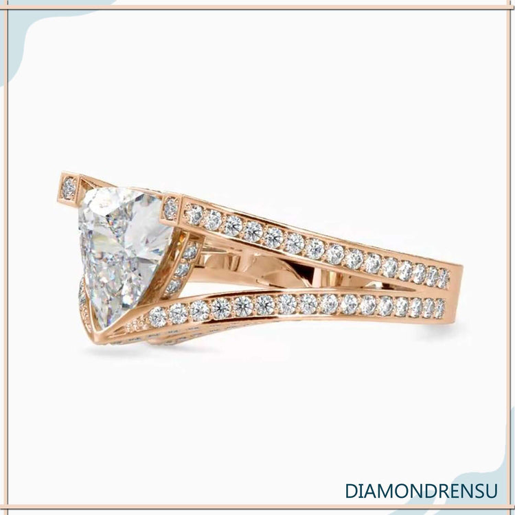 Handmade jewellery with hidden halo diamond ring style.
