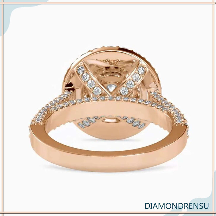 Diamondrensu UK ring with white gold and halo setting.
