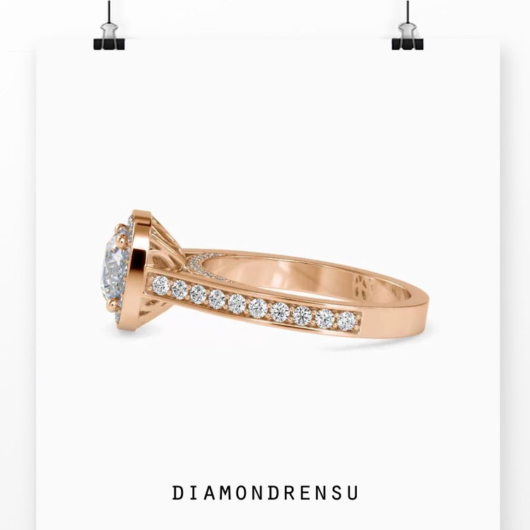 Designer ring with round cut diamond in halo setting.
