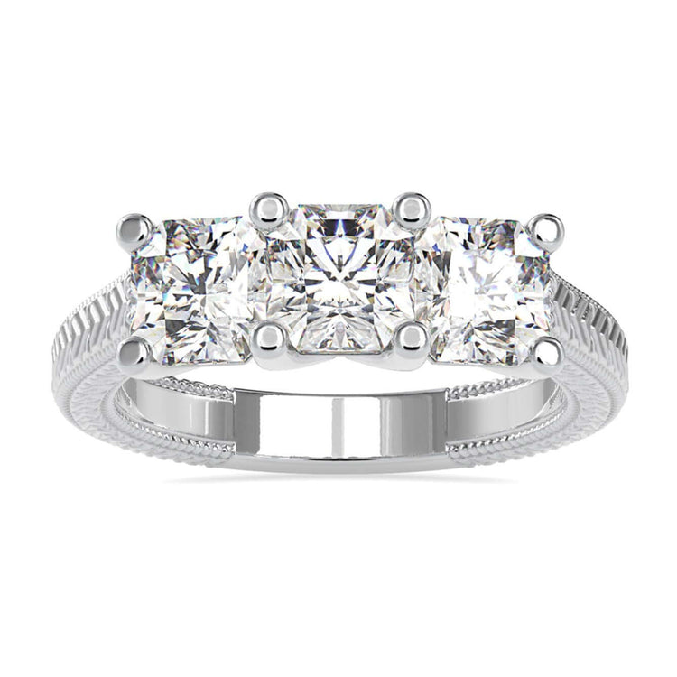 3 stone diamond engagement ring with radiant cut centre.
