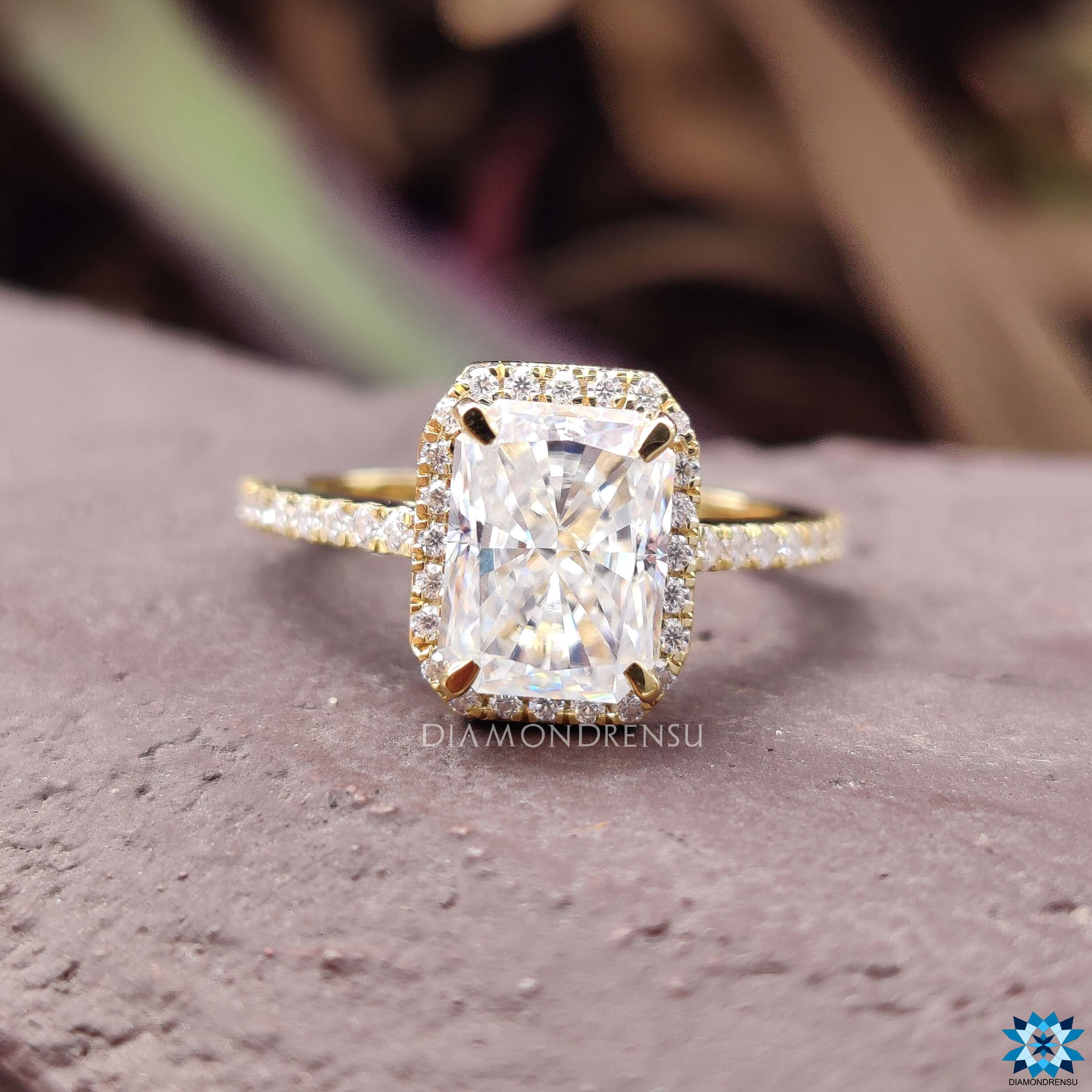 Moissanite pave ring featuring radiant cut stone in a pave setting ring.