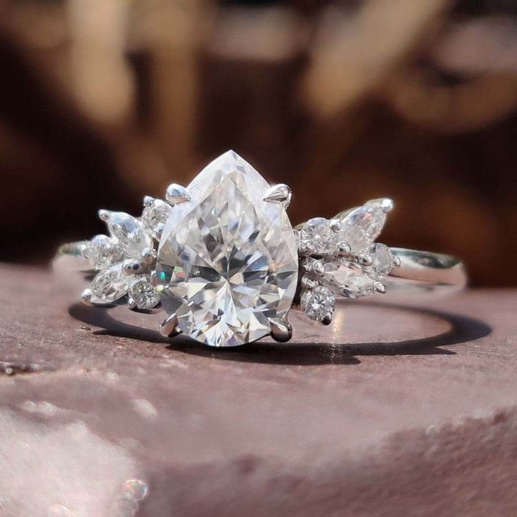Vintage moissanite ring with muse setting design.
