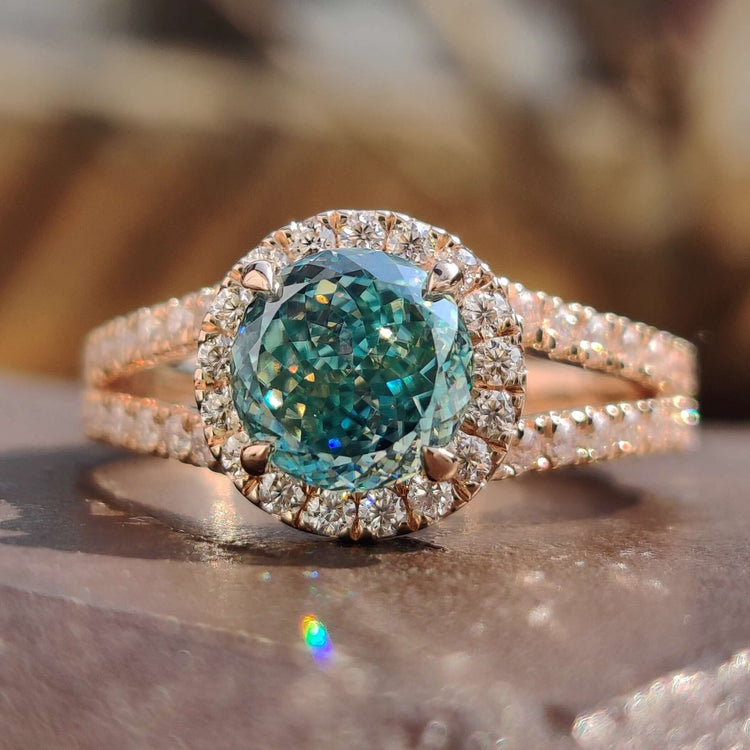 Portuguese cut moissanite ring with halo.
