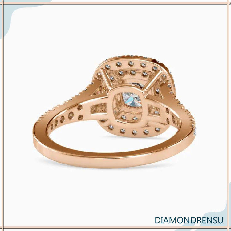 Lab diamond ring in yellow gold with round prong halo setting.
