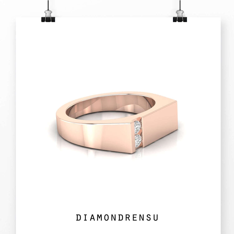 Polished finish band in yellow gold with two round diamonds.
