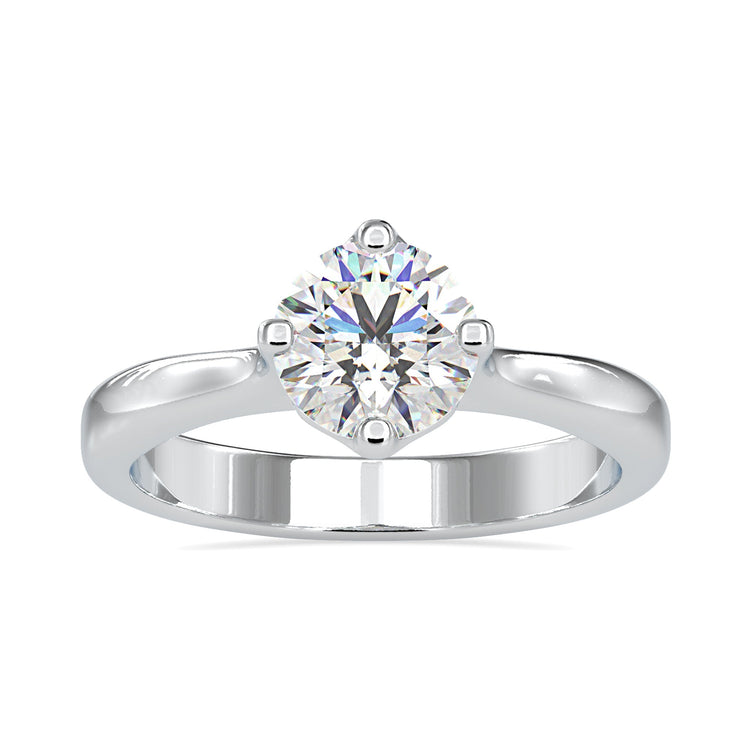 Simple diamond ring with round solitaire, UK made.
