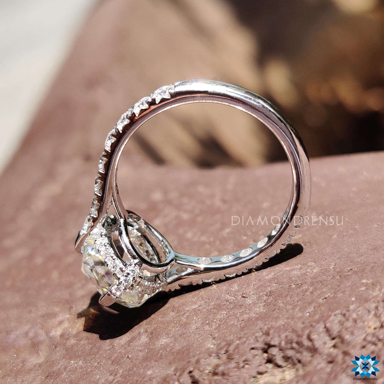 Handmade rose cut cushion ring with compass prong setting.
