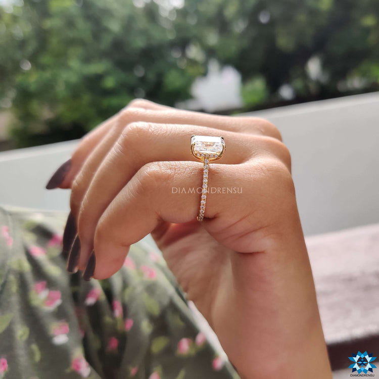 Diamondrensu UK moissanite engagement ring in yellow gold.
