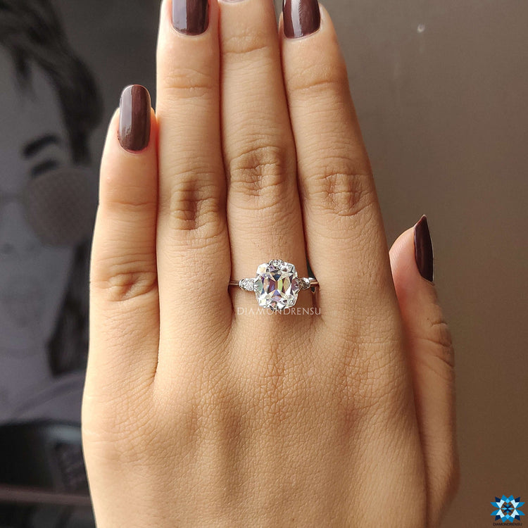 Vintage style cushion cut old European moissanite ring.
