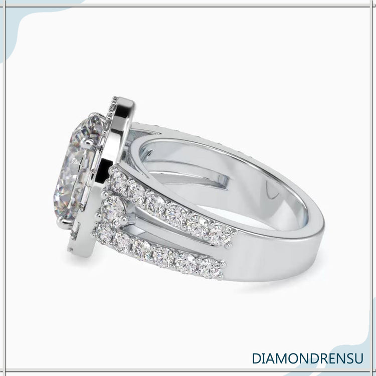 IGI certified engagement ring with oval and baguette layout.
