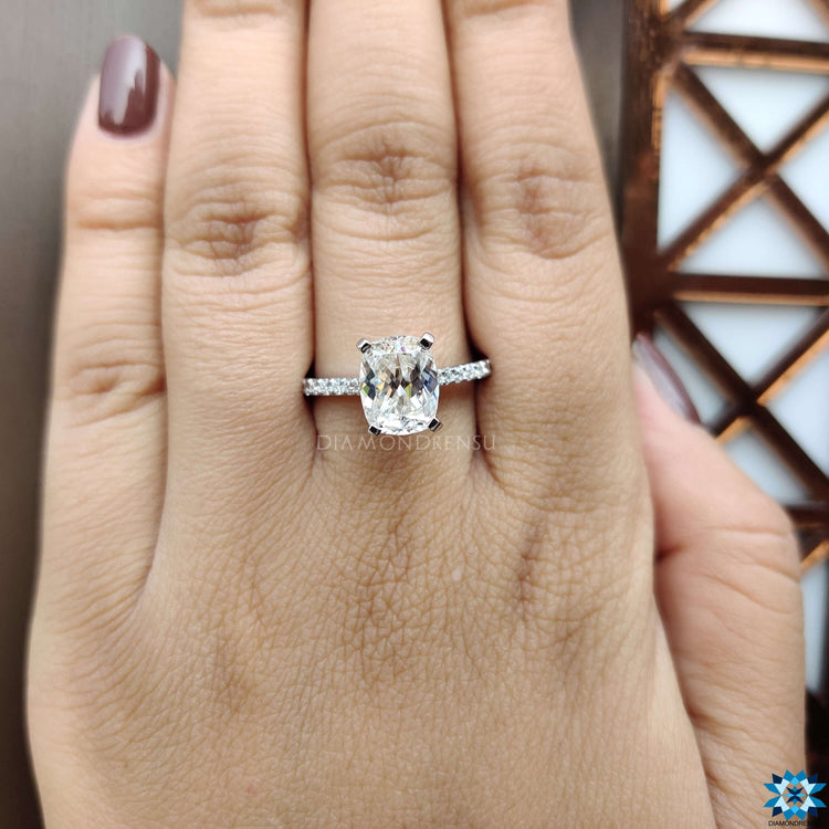 Pave moissanite engagement ring in white gold with custom details.
