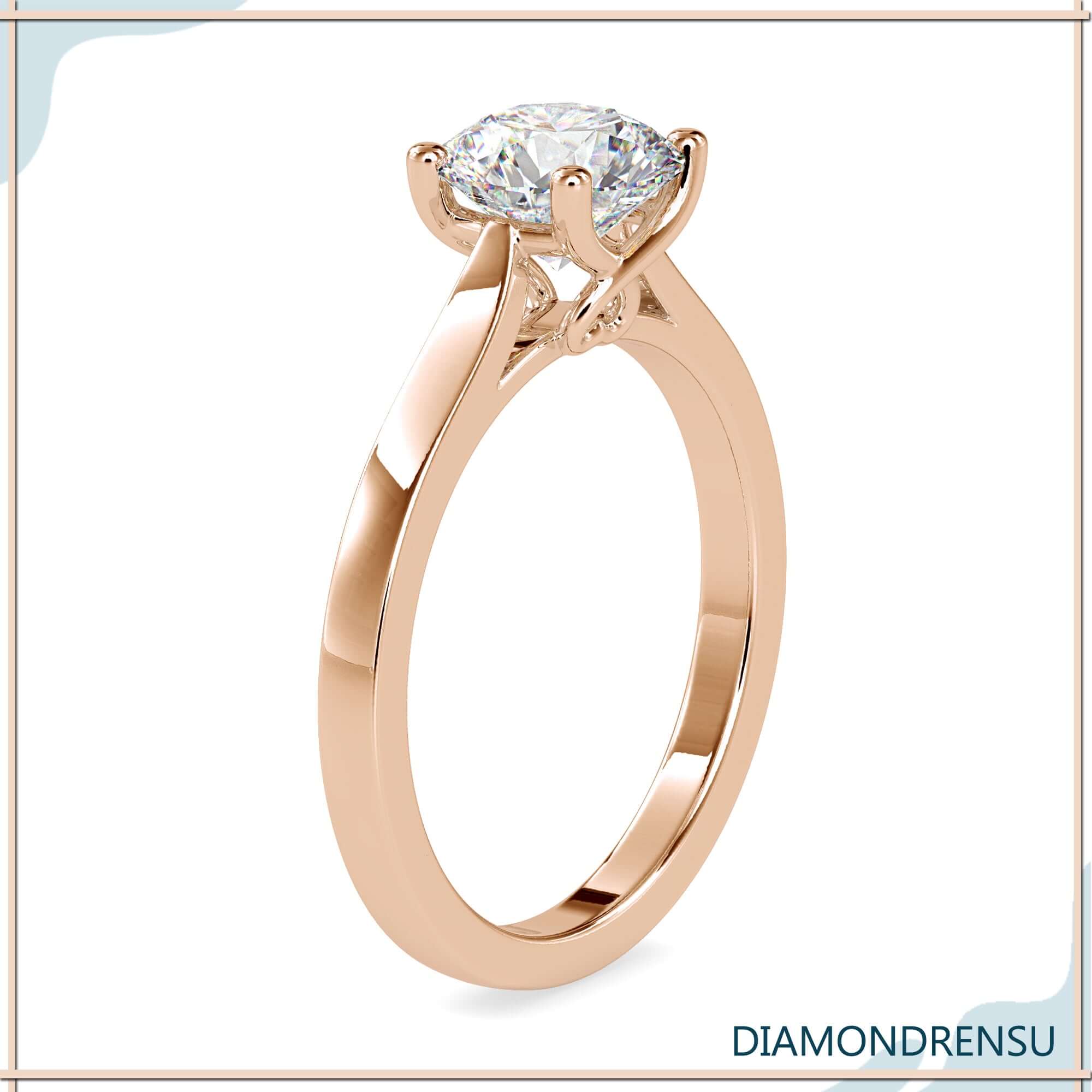 4 prong engagement ring featuring a brilliant round diamond.
