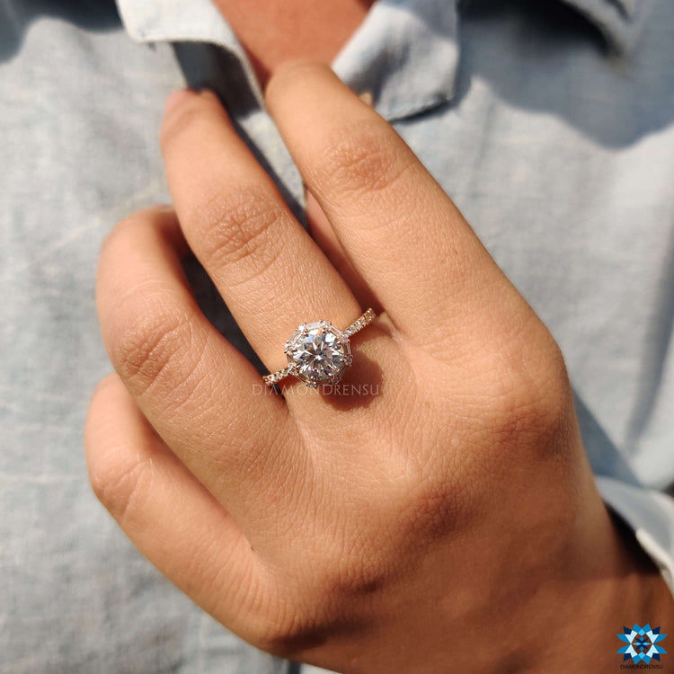 Custom handmade rose gold halo moissanite ring.
