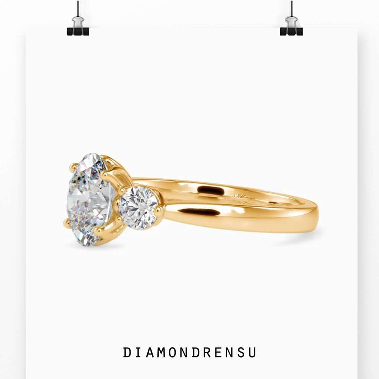 Yellow gold three stone diamond engagement ring.
