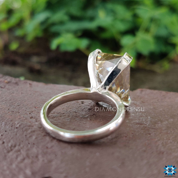 White gold engagement ring featuring criss cut moissanite.
