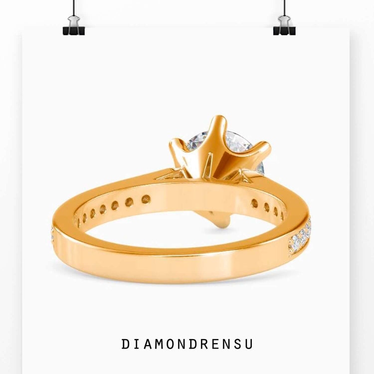 Buy engagement ring featuring channel setting and round diamond.
