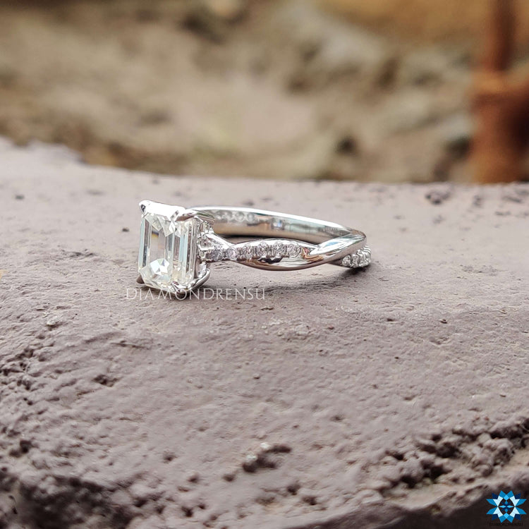 Handmade emerald cut ring in white gold with 4 claw prong.
