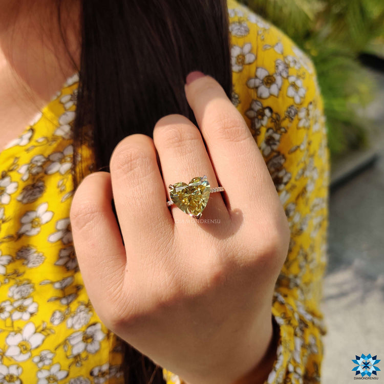 Canary yellow moissanite ring with hidden halo.
