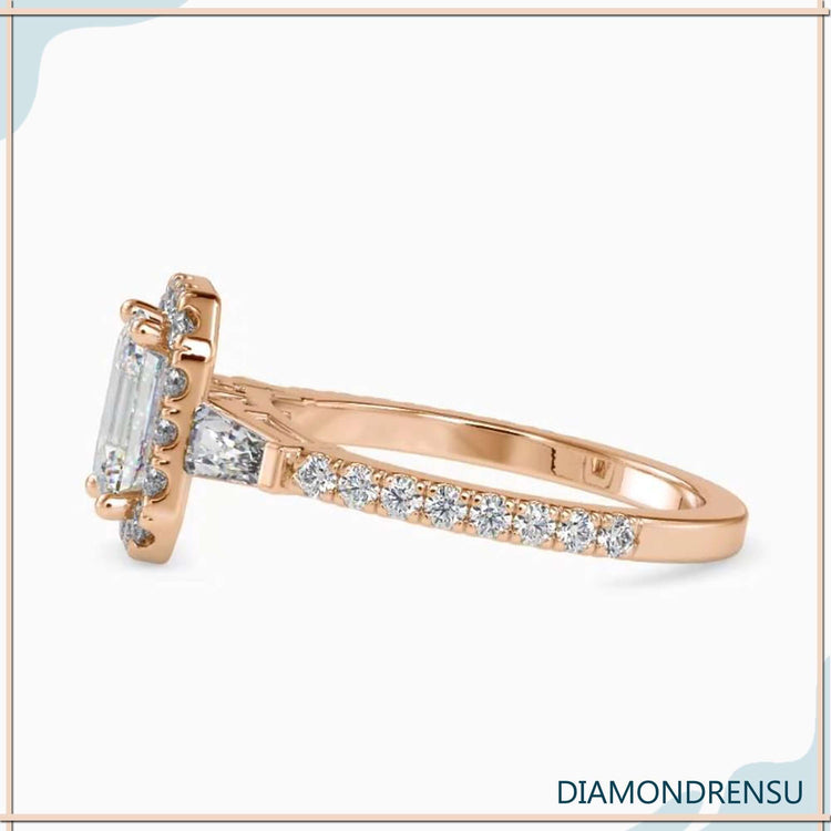 Lab grown diamond ring in halo and three stone design.
