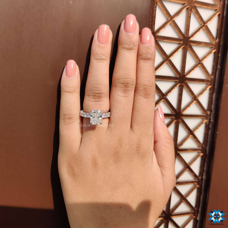 Buy moissanite ring with radiant cut stone and claw prongs.
