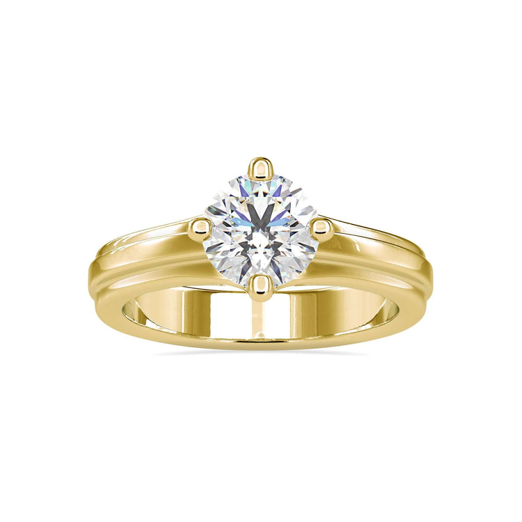 Yellow gold diamond ring with solitaire setting and handmade finish.
