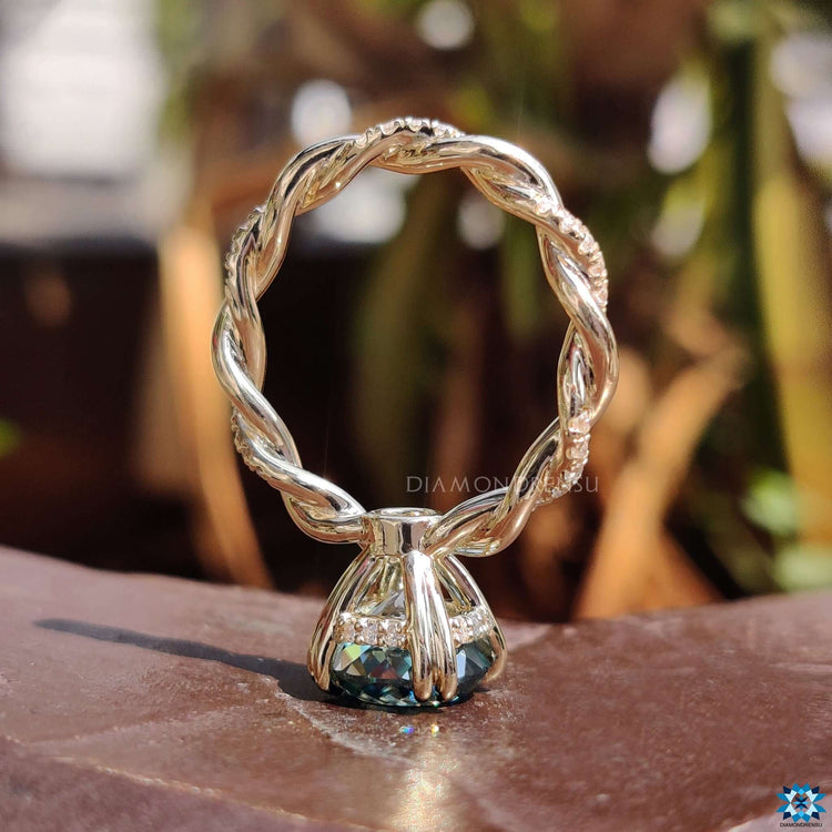 Hidden halo moissanite engagement ring.
