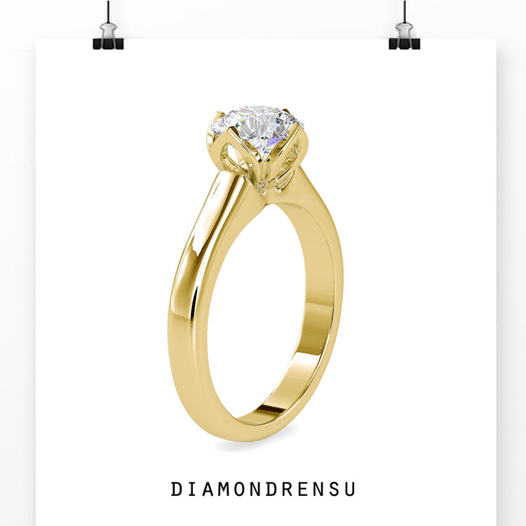 White gold diamond ring with tulip setting for round cut.
