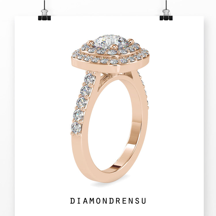 Diamondrensu UK ring with 4 prong halo and round diamond.
